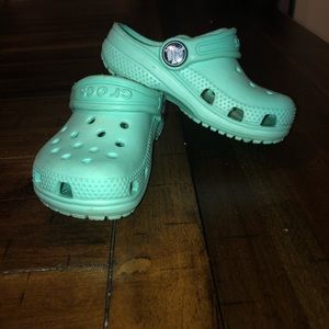 Toddler teal crocs